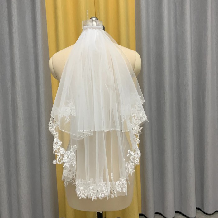 Wedding dress with short veil